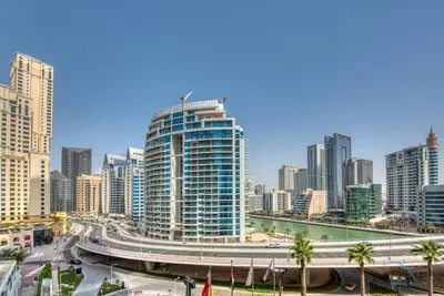 a view of a city with a highway and buildings at Exquisite 1BR at The Address Residences in JBR by Deluxe Holiday Homes in Dubai