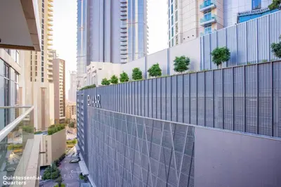 a view of a city with tall buildings at Peaceful Oasis 3BR+kids, 7 min walk to Dubai Mall in Dubai
