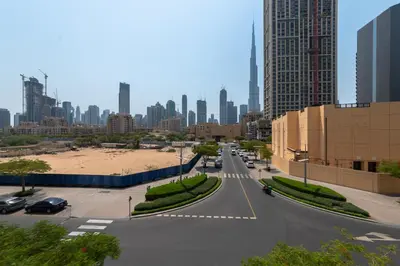 a view of a city street with a city skyline at One Bedroom in Burj Views by Radiance Vacation Stays in Dubai