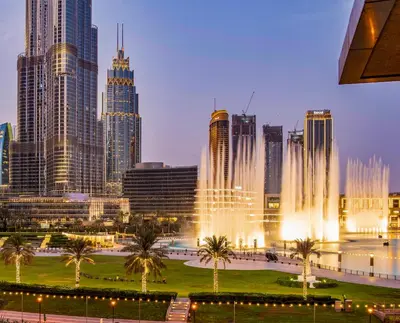 a view of a city skyline with a fountain at FIRST CLASS 2BR with full BURJ KHALIFA and FOUNTAIN VIEW in Dubai