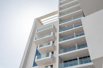 a tall building with balconies on the side of it at Frank Porter - Aura by Azizi in Dubai