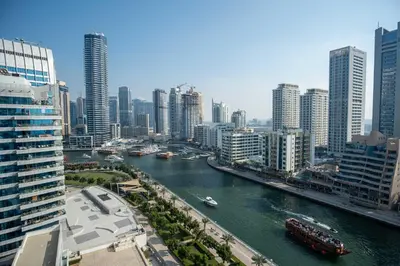 a view of a river in a city with buildings at WSuites - Big Terrace with Beautiful Marina View in Dubai