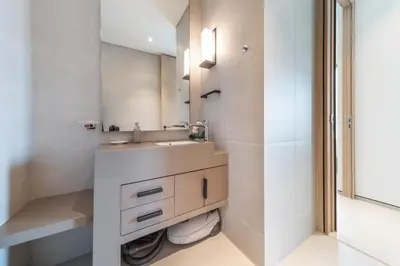 a bathroom with a sink and a mirror at EDEN'S Homes & Villas - ADDRESS BEACH Residences JBR in Dubai