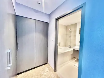a bathroom with a shower and a toilet and a sink at Ultimate Luxury at Dubai Creek Horizon Waterfront in Dubai