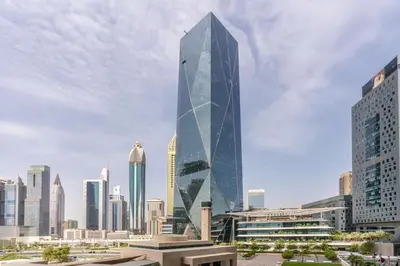 a rendering of a tall skyscraper in a city at Silkhaus newly furnished studio facing DIFC with pool and gym access in Dubai
