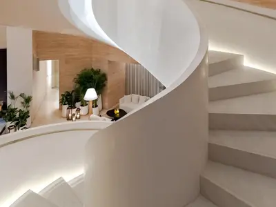 a spiral staircase in a house with a living room at The Dubai EDITION in Dubai