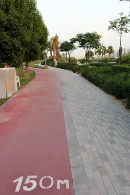 a red path with the words on it at Upgraded spacious 3BR+Maid Villa in Dubai