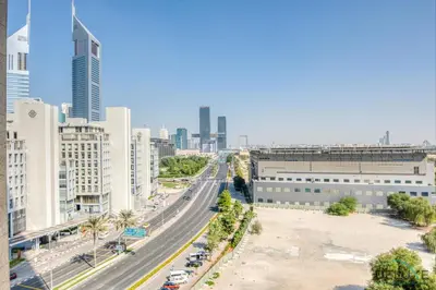 a view of a city with buildings and a highway at Upscale Studio at Sky Gardens DIFC by Deluxe Holiday Homes in Dubai