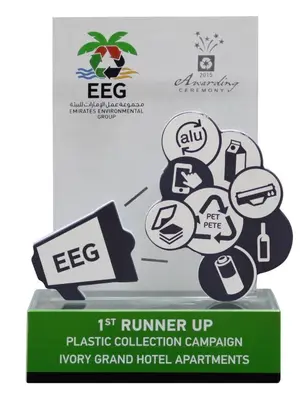 a sign for the runner up plastic collection campaign at Ivory Grand Hotel Apartments in Dubai