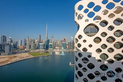a view of the city of dubai from a building at Intimate Studio at Millennium Binghatti Residence Business Bay by Deluxe Holiday Homes in Dubai
