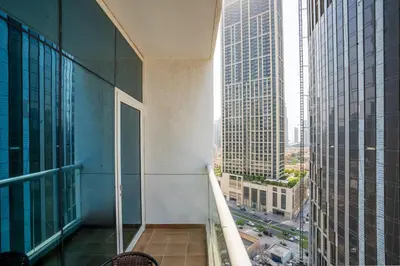 a balcony in a building with a view of a city at RH- Urban Living, Studio near Dubai Mall, Downtown in Dubai