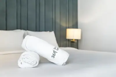 a roll of toilet paper sitting on top of a bed at Most beautiful 3 BR apt in BLUEWATERS ISLAND, DUBAI in Dubai