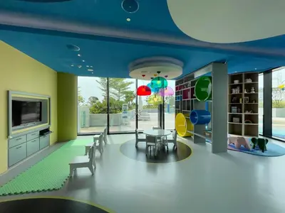 a dining room with a table and chairs and a tv at The Smart Concierge - Address JBR in Dubai