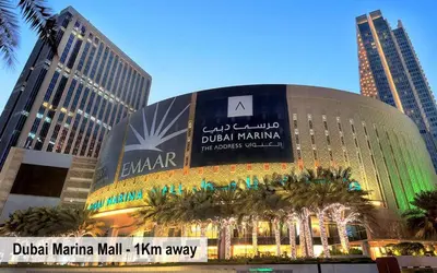 a large building in a city with tall buildings at Luxury Escapes - Studio in JLT X1 Tower close to Metro in Dubai