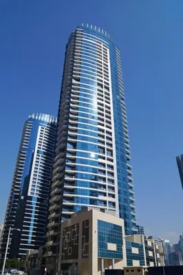 two tall skyscrapers in a city with at GuestReady - Elegant 1BR w/ Balcony | Dubai Marina in Dubai