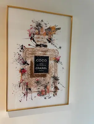 a picture of a painting of a book on a wall at Big studio, Dubai SportCity, parking included in Dubai