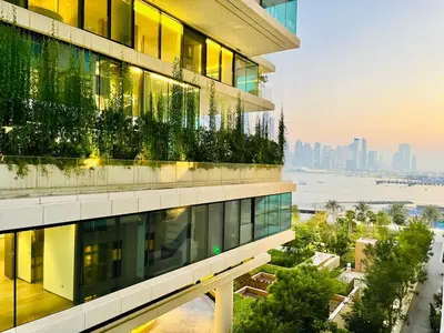 a building with plants on the side of it at FIVE Palm Jumeirah - 2 Bedrooms & Maid Room Apartment in a Splendid Resort in Dubai