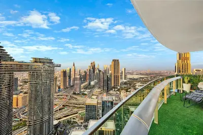 a view of a city from the top of a building at Luxury 2BR with Skyline and Sea Views, Near Burj Khalifa & Dubai Mall in Dubai