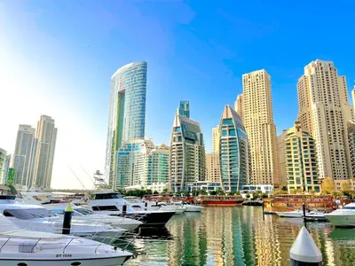 a group of boats in a harbor in a city at Luxury Studio Apartment Close to JBR Beach&Yacht Club&Metro-Available Airport Shuttle in Dubai