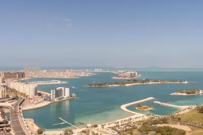 an aerial view of the city and the harbor at ON OFF HH-AVANI HOTEL-3BR -Full Palm View in Dubai