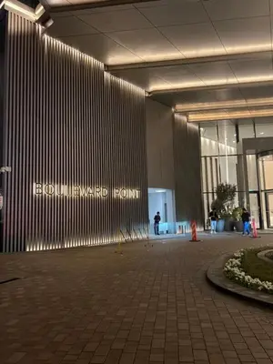 a lobby of a building with a sign that reads bottom wanted horn at Burj Khalifa view, 3 Bedroom Apartment in Boulevard Point, Connected to Dubai Mall in Dubai