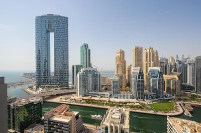 an aerial view of a city with tall buildings at Frank Porter - Studio One in Dubai