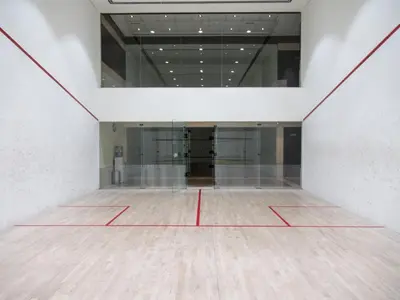 an empty room with a tennis court on the floor at GuestReady - Marina View | Fairfield Tower in Dubai