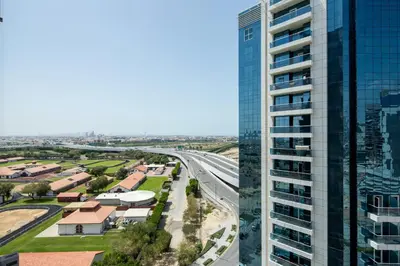 a view of a tall building and a street at Frank Porter - Capital Bay Tower B in Dubai