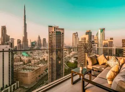 a living room with a view of a city at Elite Royal Apartment - Panoramic Burj Khalifa, Fountain & Dubai skyline view - Marquise in Dubai