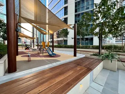 a playground in a city with a slide at Silkhaus unique 1BDR pad gorgeous view in new tower in Dubai
