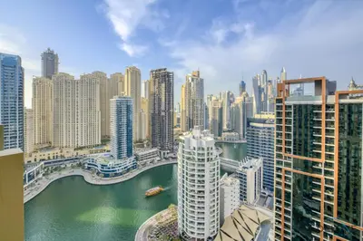 a view of a city with a river and buildings at Regal Studio at The Address Residences Dubai Marina by Deluxe Holiday Homes in Dubai