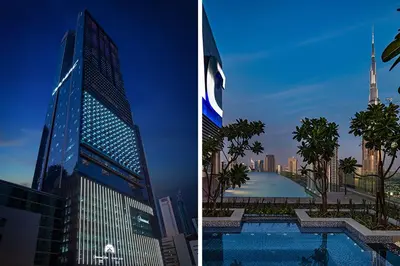 a tall building with a pool in front of a city at Paramount Midtown -Stunning 2 Bedroom Apt with Burj-Khalifa view in Dubai