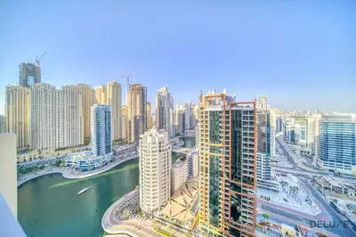 a view of a city with a river and buildings at Pristine 1BR in The Address Residences Dubai Marina by Deluxe Holiday Homes in Dubai