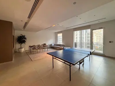 a living room with a ping pong table in it at Frank Porter - Creek Horizon T2 in Dubai