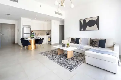 a living room with a couch and a table at Frank Porter - Creek Horizon T2 in Dubai