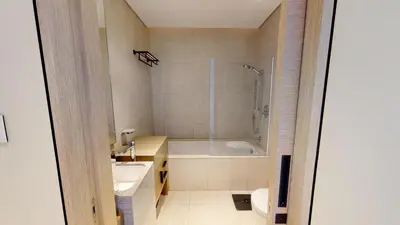 a bathroom with a tub and a sink and a shower at Address JBR Sea View, Jumeirah Beach Residence, Dubai Marina - Mint Stay in Dubai