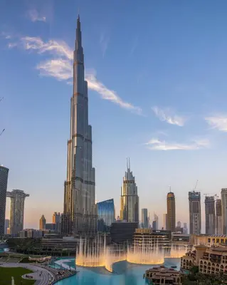 a view of the worlds tallest building with a fountain at FIRST CLASS 3BR with full BURJ KHALIFA VIEW in Dubai