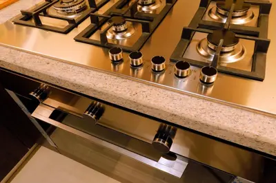 a stove top oven sitting on top of a counter at Elegant Apartment with Direct access to Dubai Mall in Dubai