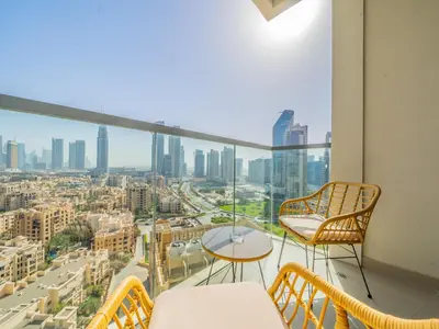 a balcony with a view of a city at Glamorous Apartment Facing Burj Khalifa in Dubai