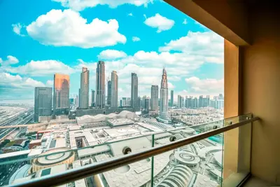a view of a city from a skyscraper at FAHH Stunning 1 BHK at Address Dubai Mall in Dubai