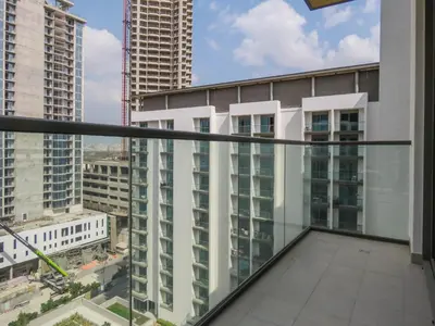 a view from the balcony of a building at OYO 755 Home Sobha Greens in Dubai