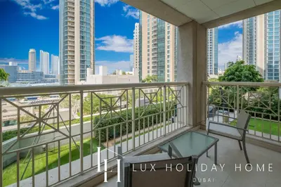 a balcony with a view of the city at LUX - The Downtown Blvd Suite in Dubai
