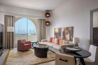 a living room with a couch and a table at Marriott Executive Apartments Al Jaddaf, Dubai in Dubai