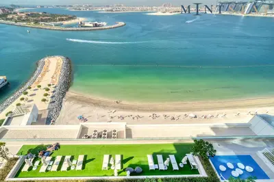 an aerial view of a beach and the ocean at Beach Vista 1 Emaar Beachfront - Mint Stay in Dubai