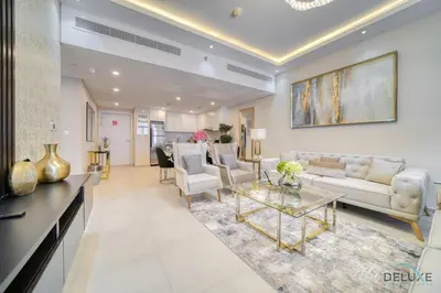 a living room with a couch and a table at Exclusive Deal Stunning 1BR at Madinat Jumeirah by Deluxe Holiday Homes in Dubai