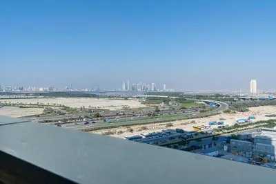 an aerial view of a airport with a highway at White Sage - Elegant Apartment With Unobstructed City Views in Dubai