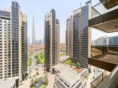 an aerial view of a city with tall buildings at Luton Vacation Homes - Elite Downtown Residence Studio, Burj Khalifa View Dubai - 80AB3 in Dubai