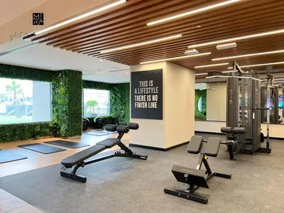 a gym with exercise equipment in a building at Mira Holiday Homes - Furnished studio in Downtown in Dubai