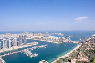 an aerial view of a harbor with boats in the water at Veer Apartments - 82nd Floor Princess Tower - Palm View in Dubai