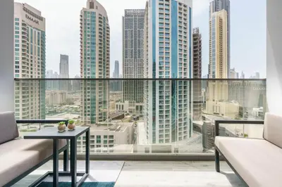 a balcony with a view of a city skyline at GuestReady - Charming Loft 7mins from Burj Khalifa in Dubai